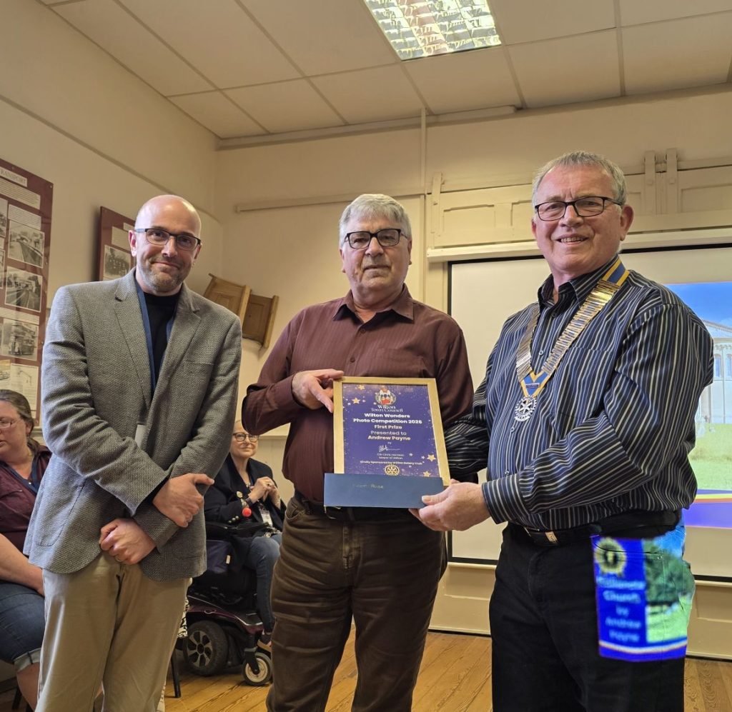 Photo competition winner Andrew Payne receiving his certificate and prize from the Mayor of Wilton and Wilton Rotary Club